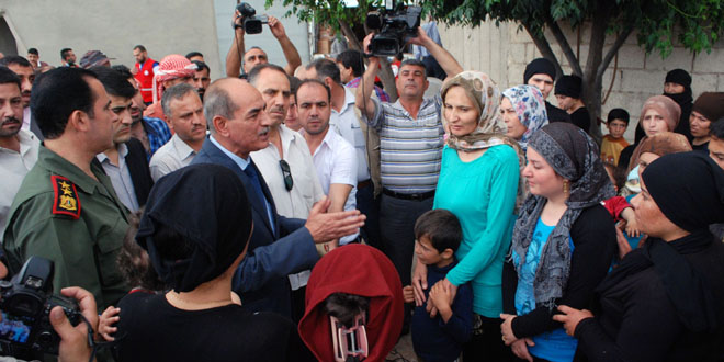Hama Governor visits displaced families from al-Zara village