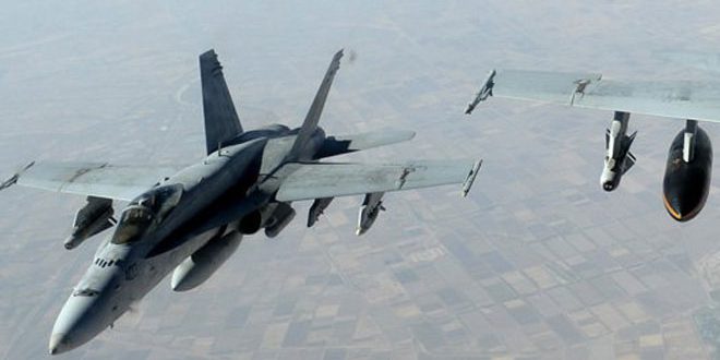 US-led coalitions airstrikes kill 11 civilians in Raqqa