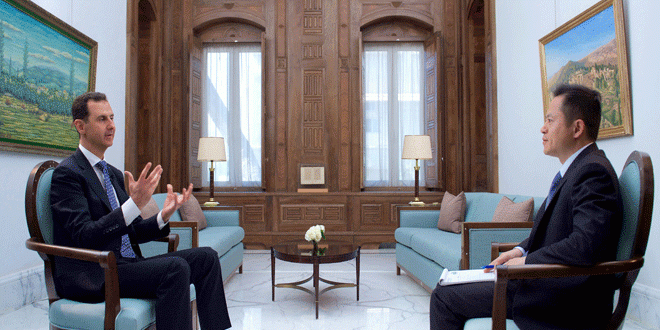 President al-Assad to Chinese Phoenix TV: any foreign troops coming to Syria without permission are invaders-video